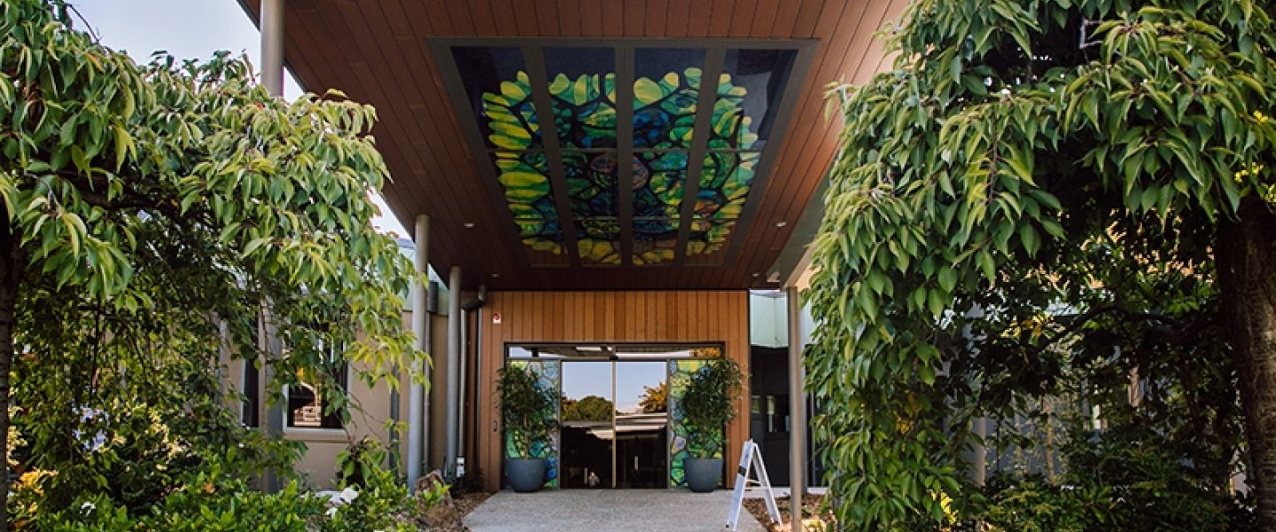 A photograph of the exterior of the Community Care and Wellbeing building at Springvale Botanical Cemetery