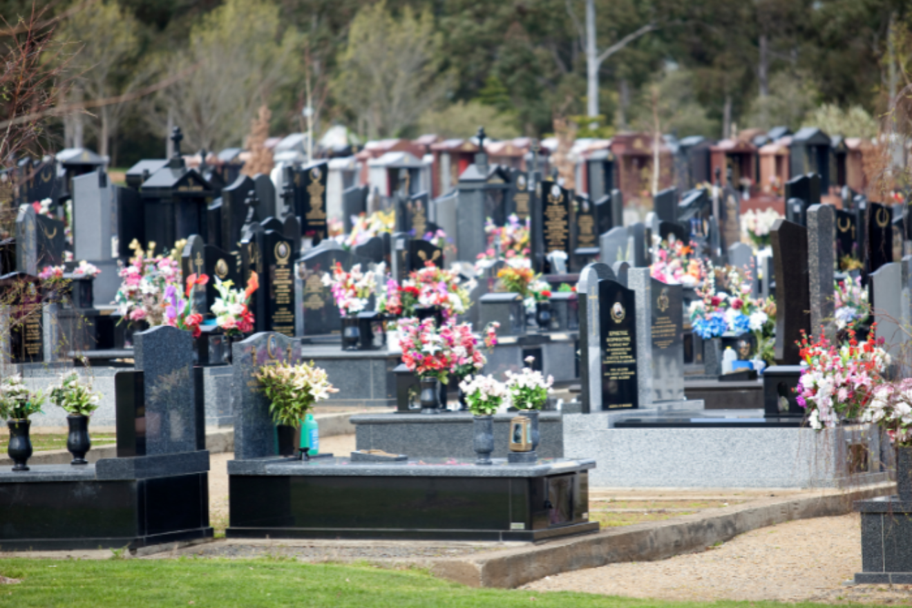 A view of a cemetery with monumental graves.
