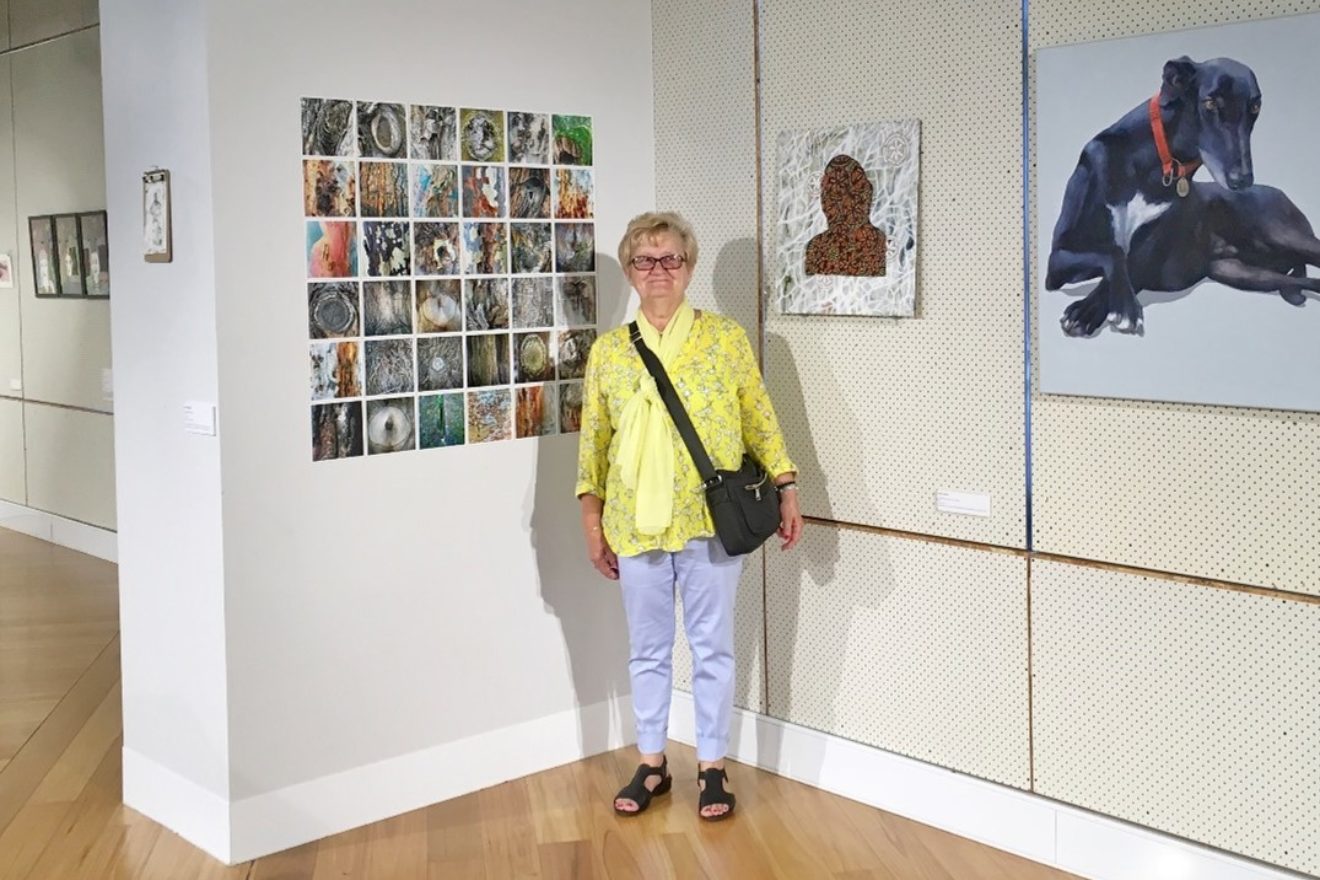 A photograph of artist Vanja Radisic's mother at an art exhibition