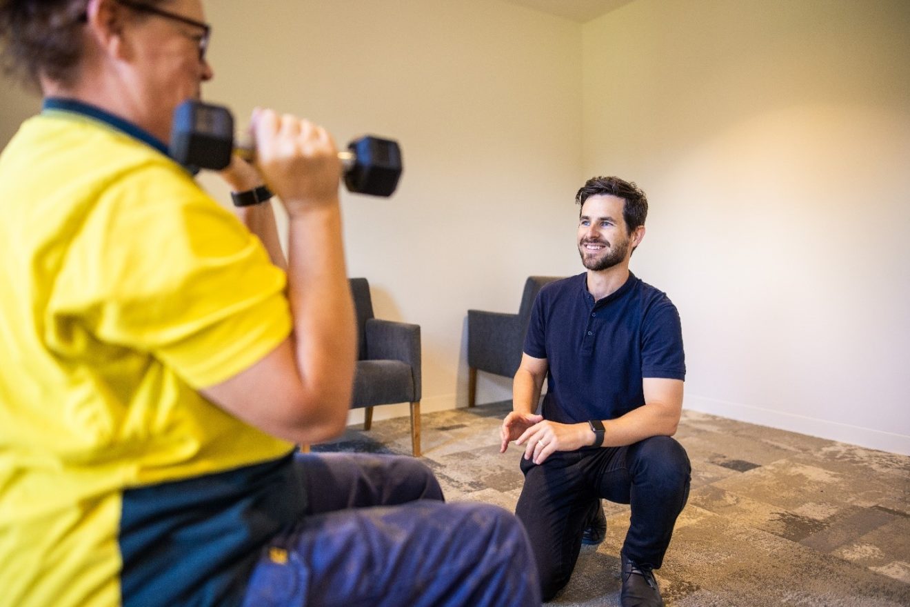A photograph of SMCT Osteopath Tom Peasley providing treatment