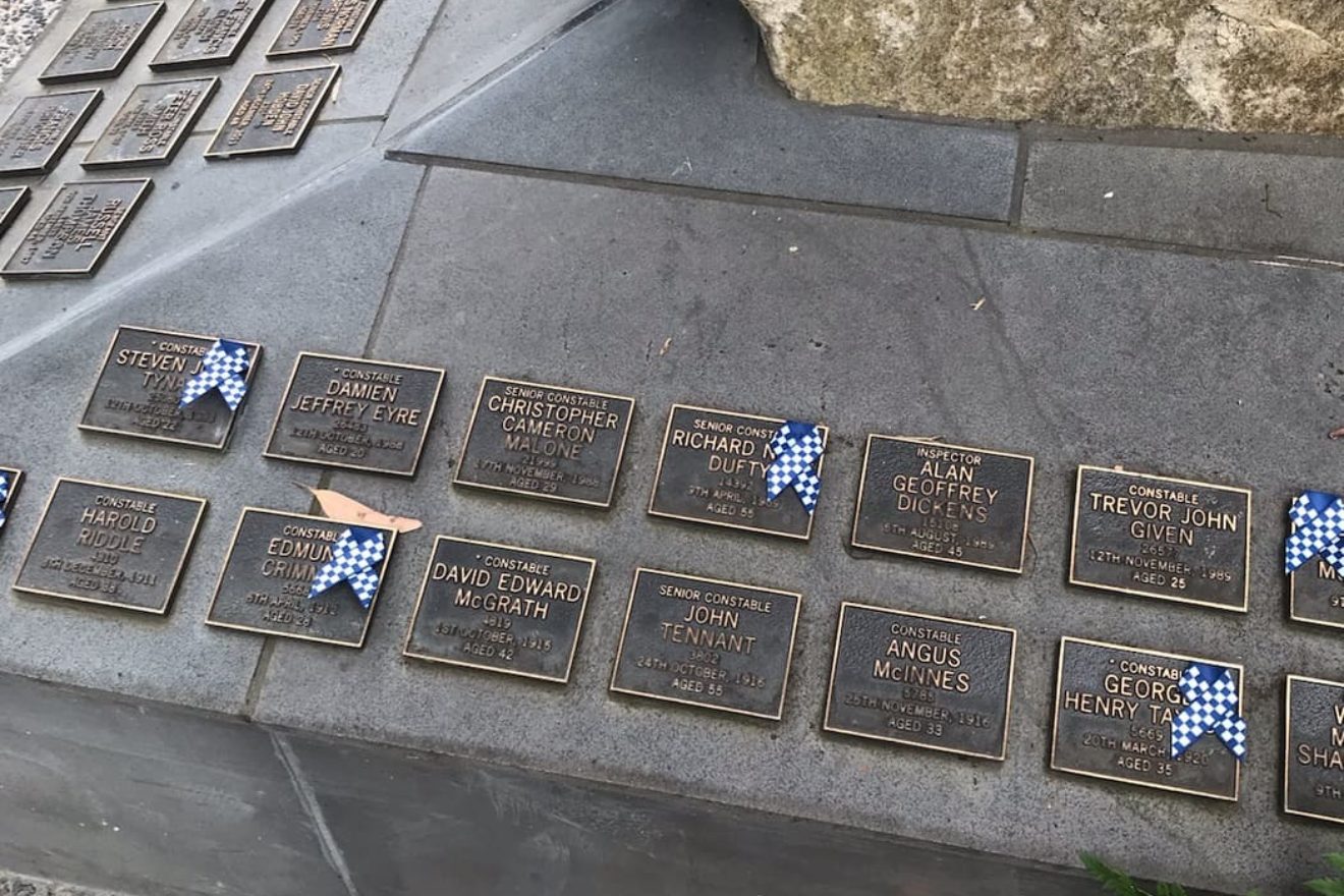 blue ribbons on police memorial